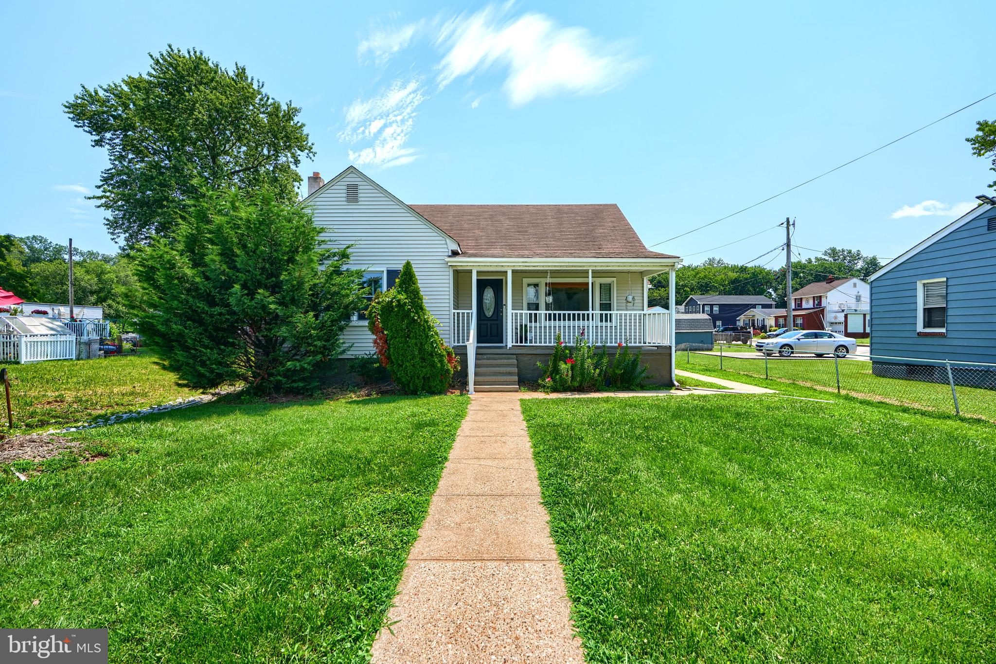 2903 Sparrows Point Road Sparrows Point, MD 21219 - Photo 1 of 57 a front view of a house with a yard