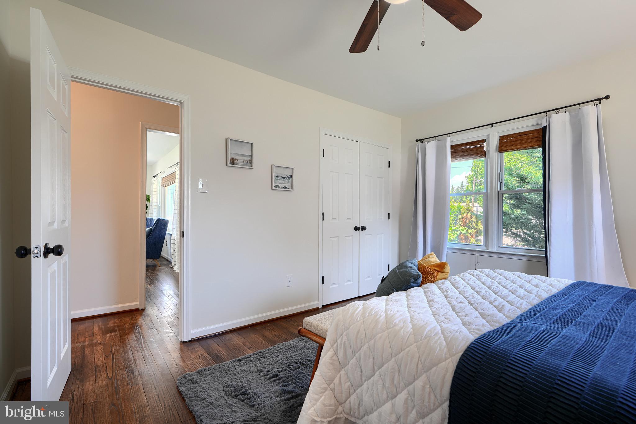 2903 Sparrows Point Road Sparrows Point, MD 21219 - Photo 23 of 57 a bedroom with a bed and wooden floor