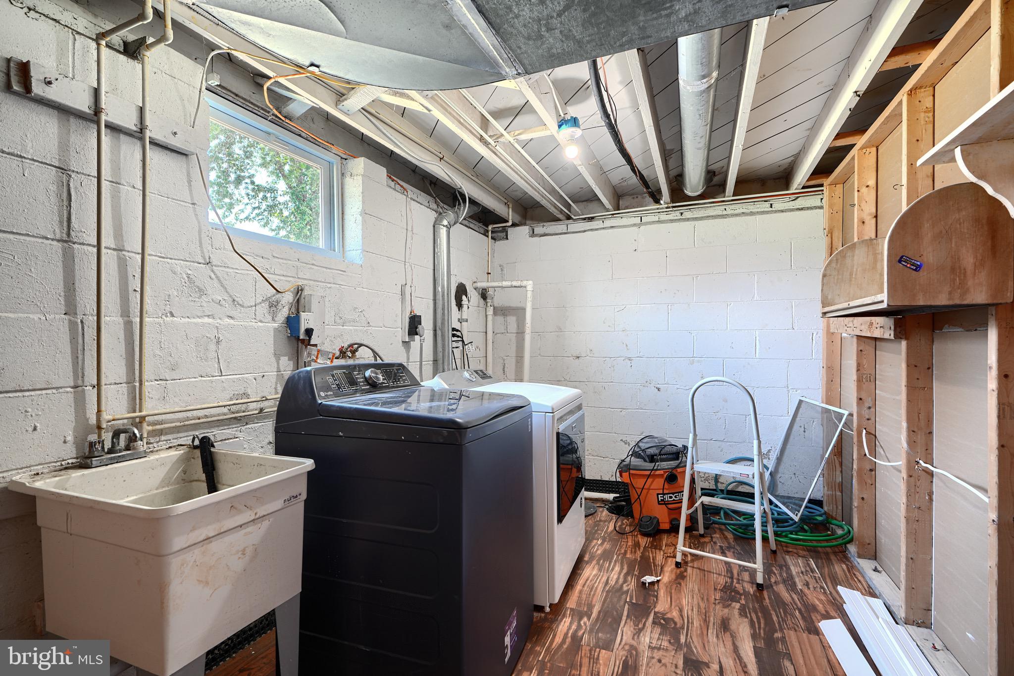 2903 Sparrows Point Road Sparrows Point, MD 21219 - Photo 50 of 57 a storage utility room with two washing machine