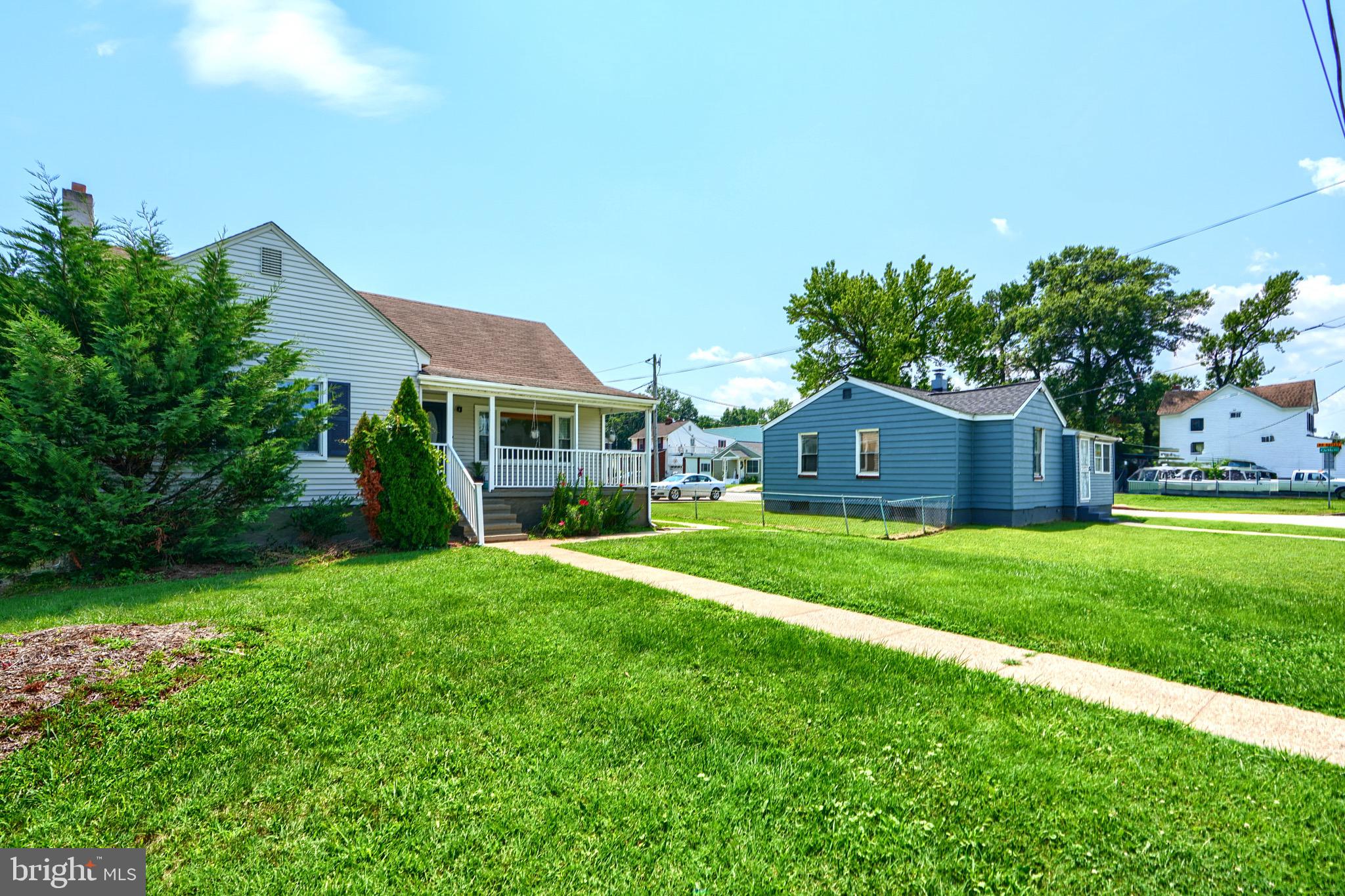 2903 Sparrows Point Road Sparrows Point, MD 21219 - Photo 52 of 57 a front view of a house with a yard
