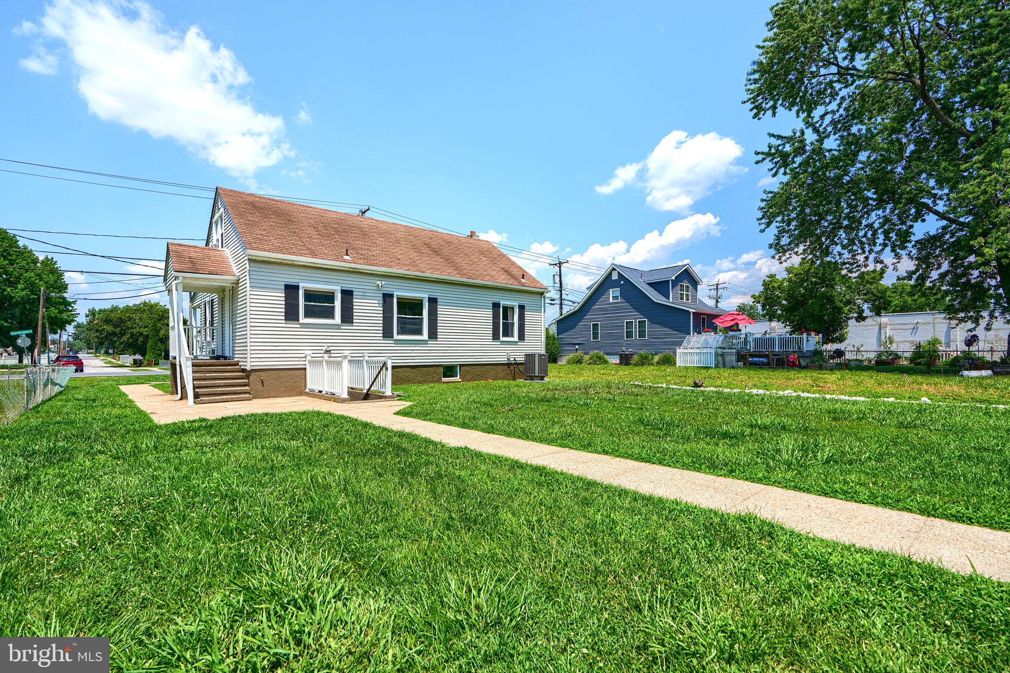 2903 Sparrows Point Road Sparrows Point, MD 21219 - Photo 54 of 57 a front view of house with yard and green space