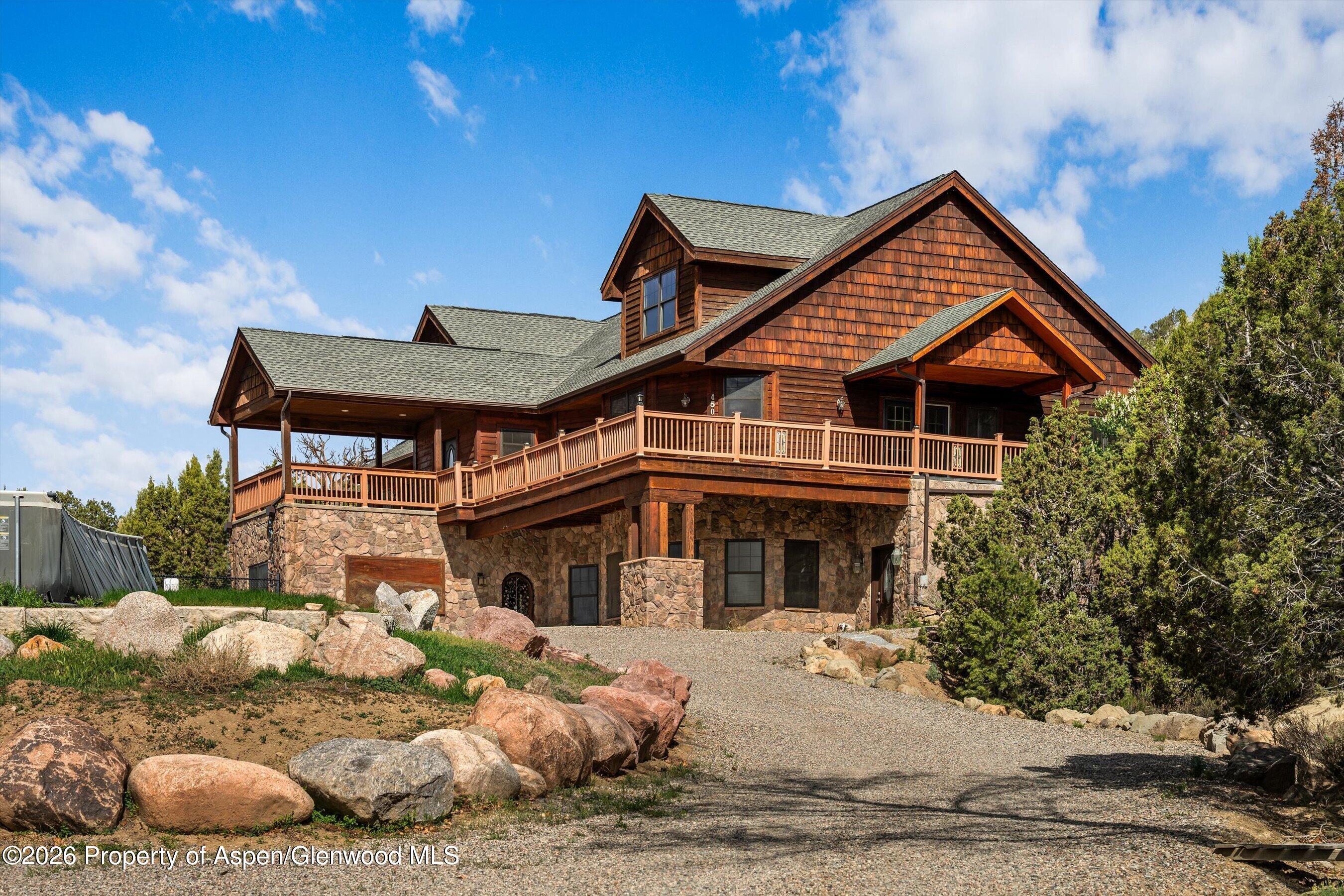 450 Summer Falls Road Silt, CO 81652 - Photo 47 of 50 a front view of a house with a yard