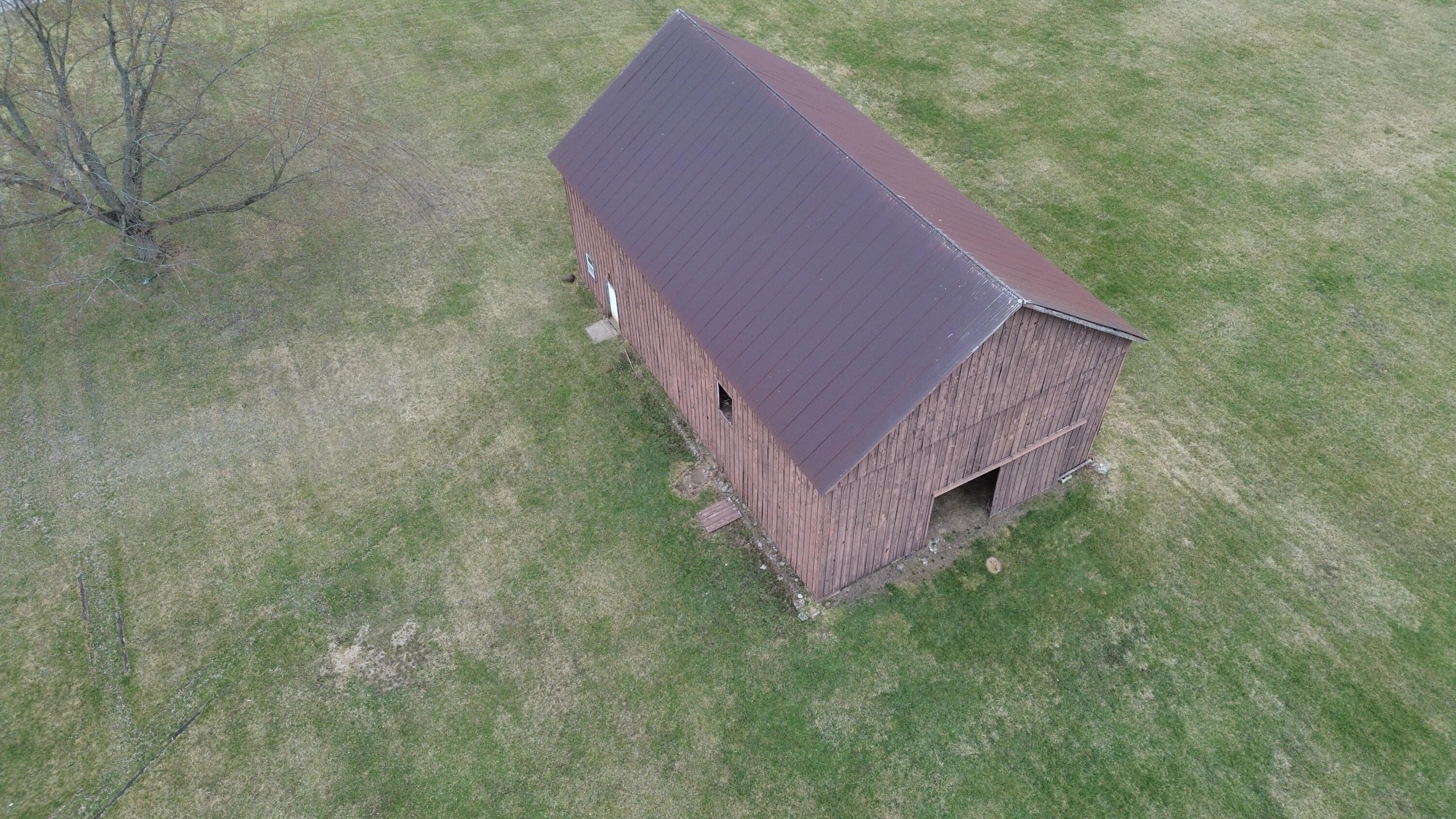 12813 Grant Street Crown Point, IN 46307 - Photo 2 of 3 a backyard of a house with lots of green space