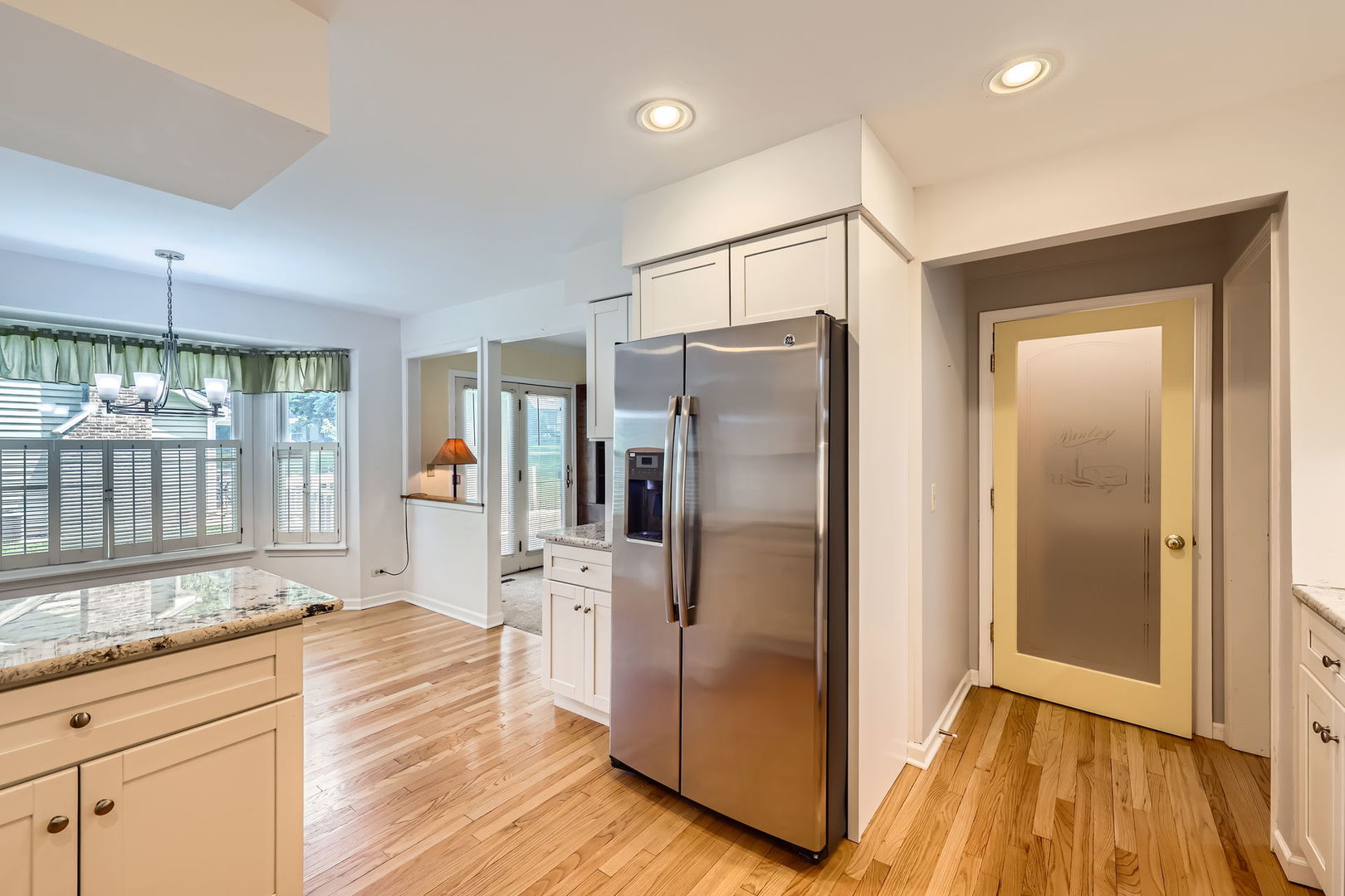 201 South Wulff Street Cary, IL 60013 - Photo 6 of 31 a kitchen with stainless steel appliances granite countertop a refrigerator and a sink
