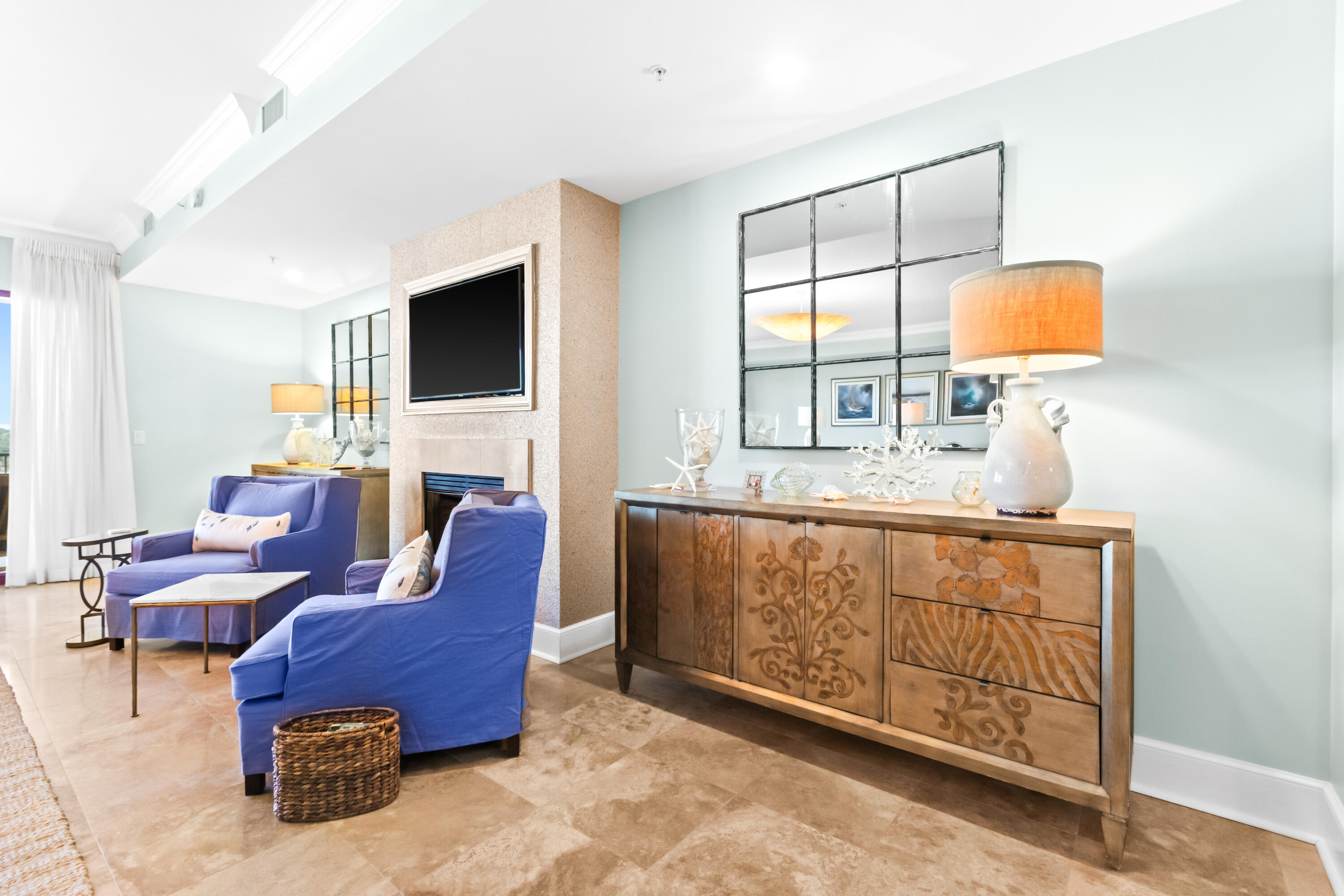 1363 West County Highway 30A, Unit 2120 Santa Rosa Beach, FL 32459 - Photo 12 of 107 a living room with furniture a flat screen tv and a window