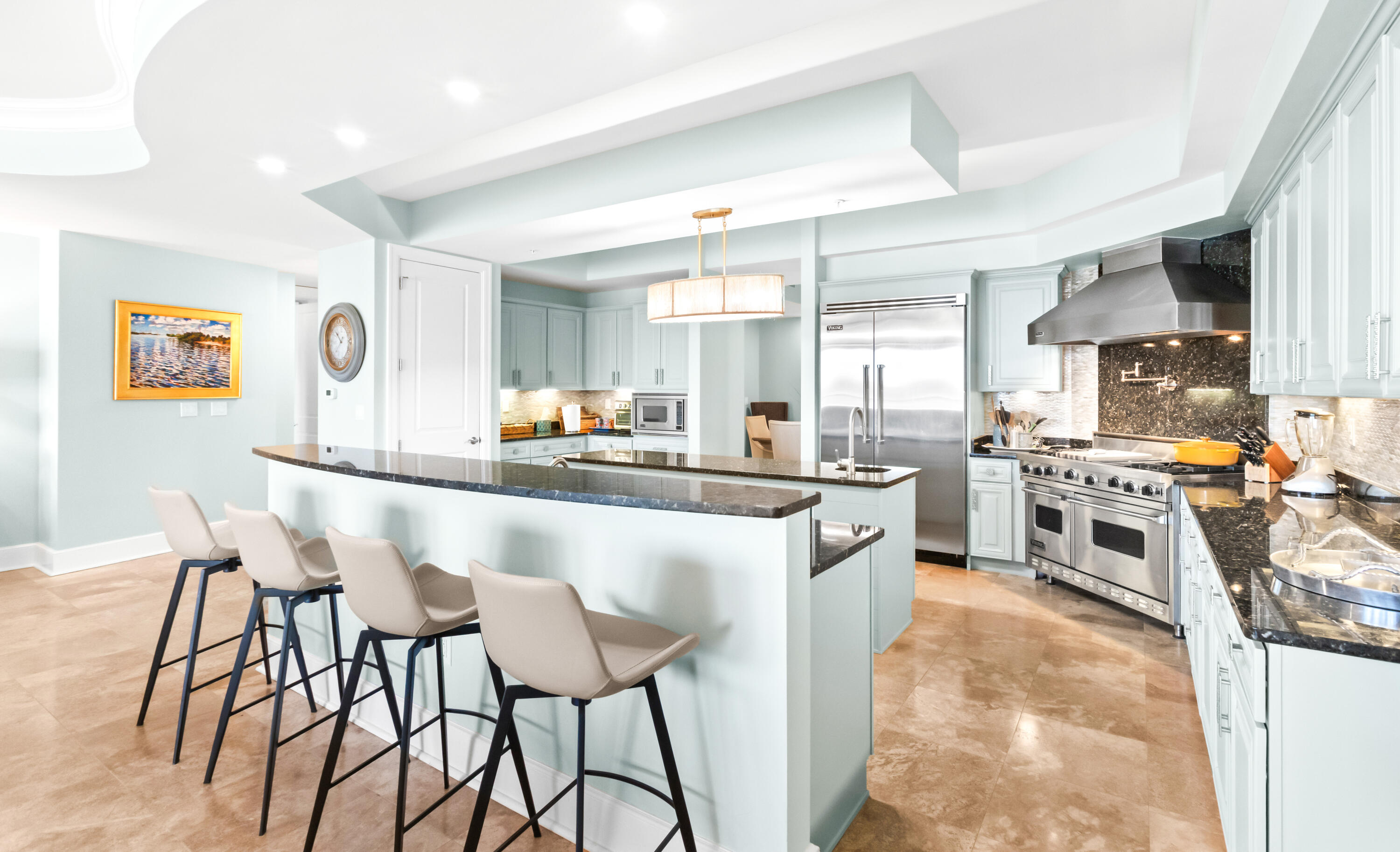 1363 West County Highway 30A, Unit 2120 Santa Rosa Beach, FL 32459 - Photo 15 of 107 a kitchen with stainless steel appliances kitchen island granite countertop a stove a sink and a refrigerator