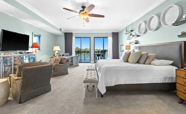 a bathroom with a granite countertop sink a mirror a vanity and shower