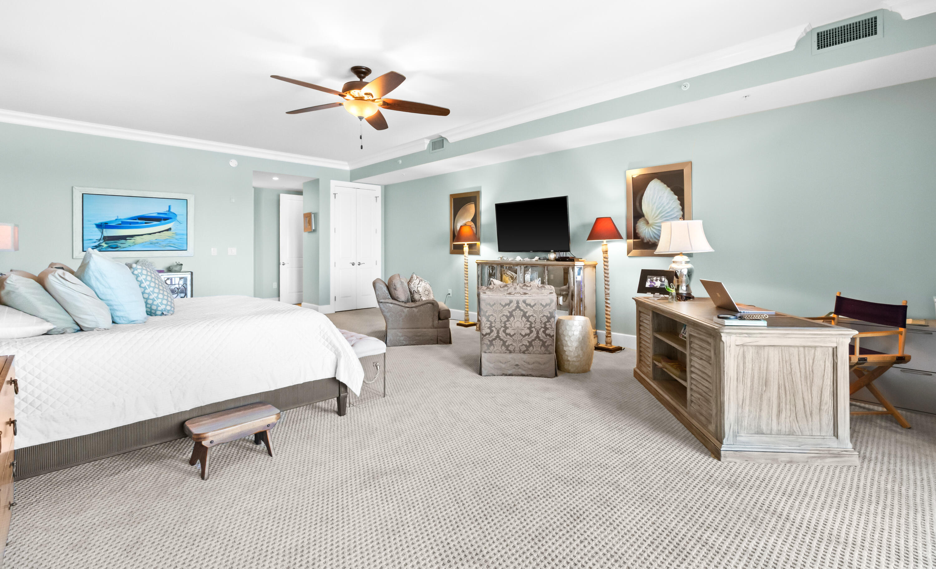 1363 West County Highway 30A, Unit 2120 Santa Rosa Beach, FL 32459 - Photo 30 of 107 a living room with furniture and a flat screen tv