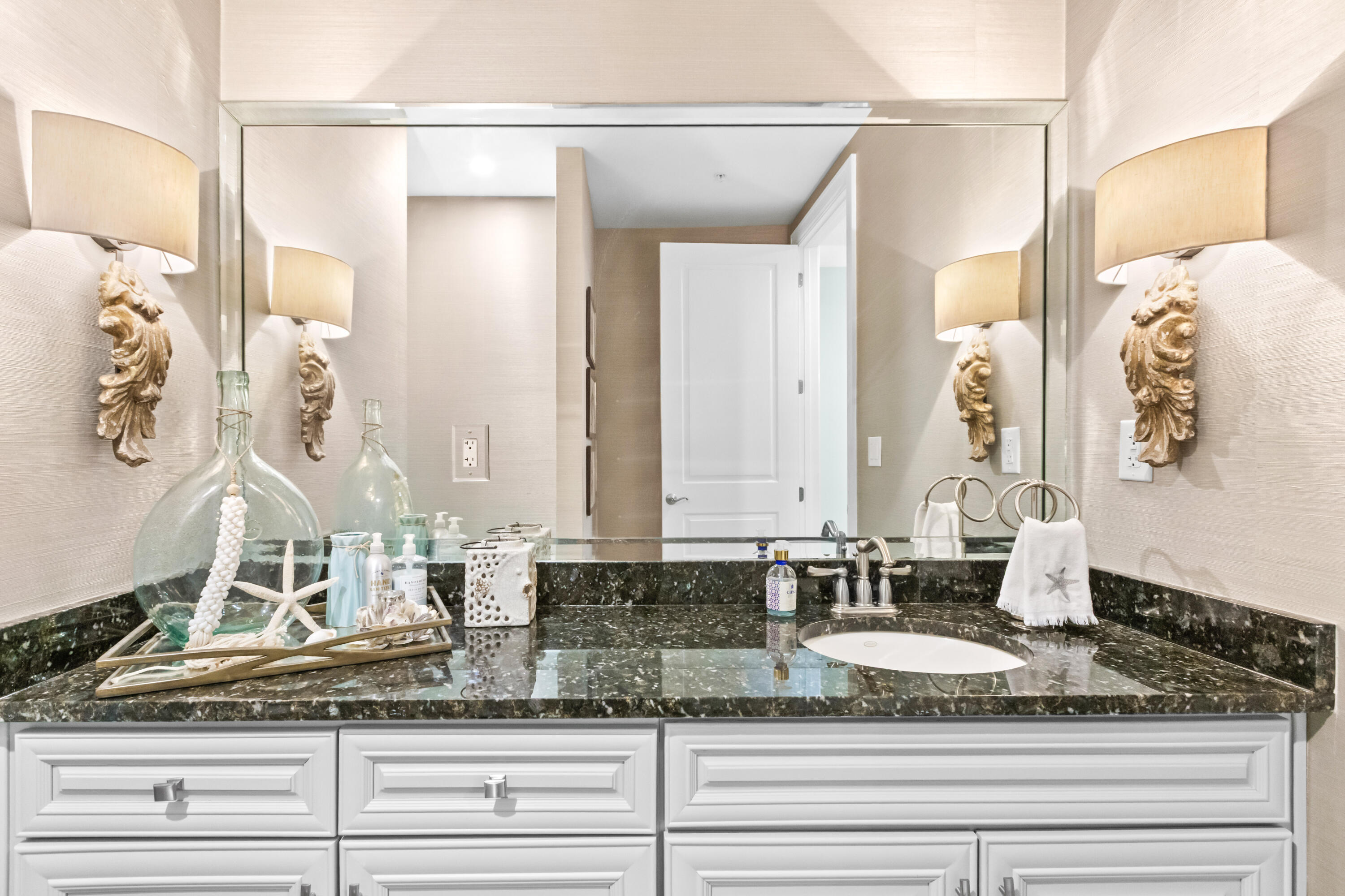 1363 West County Highway 30A, Unit 2120 Santa Rosa Beach, FL 32459 - Photo 39 of 107 a bathroom with a granite countertop sink and a mirror