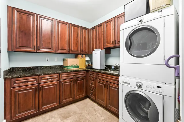a view of a swimming pool with a lounge chair