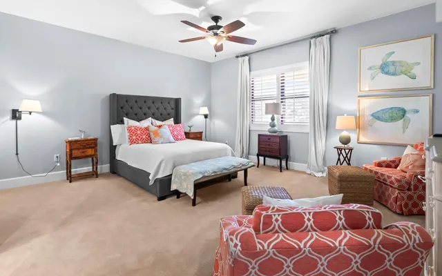 a view of a lake with houses in the back