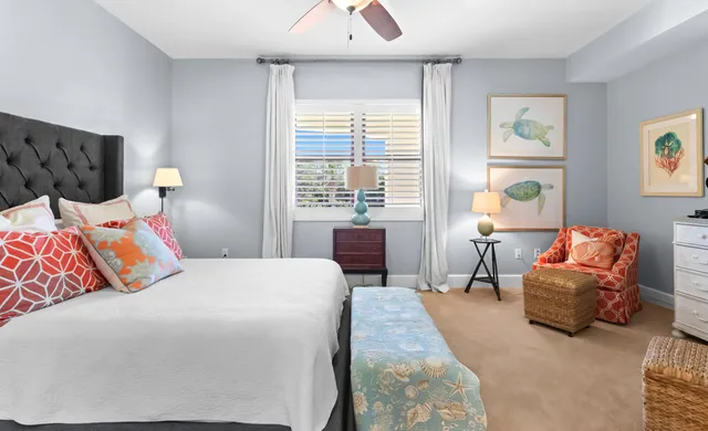 a view of a lake with houses in the back