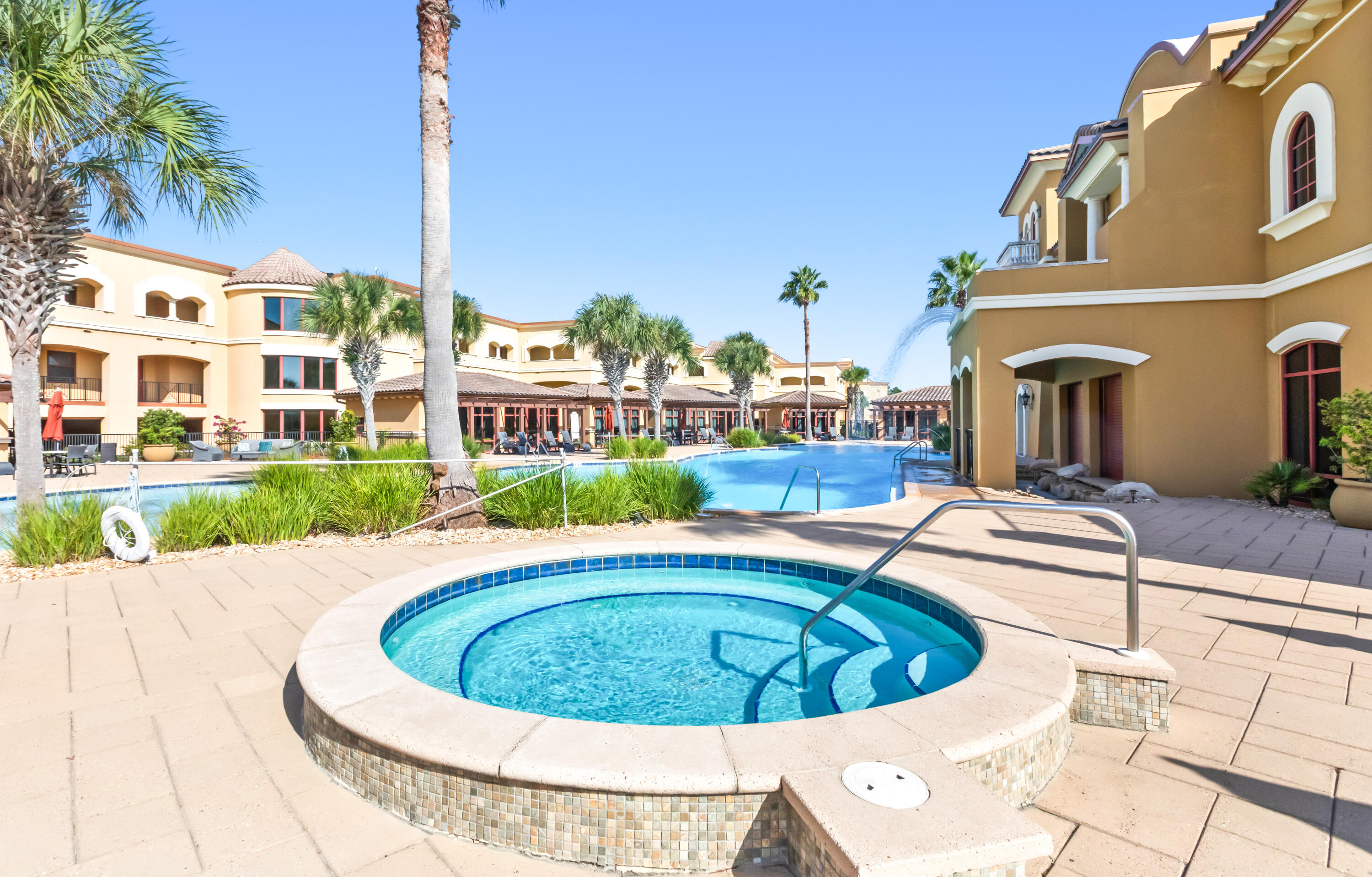 1363 West County Highway 30A, Unit 2120 Santa Rosa Beach, FL 32459 - Photo 63 of 107 a view of a swimming pool with a lounge chairs