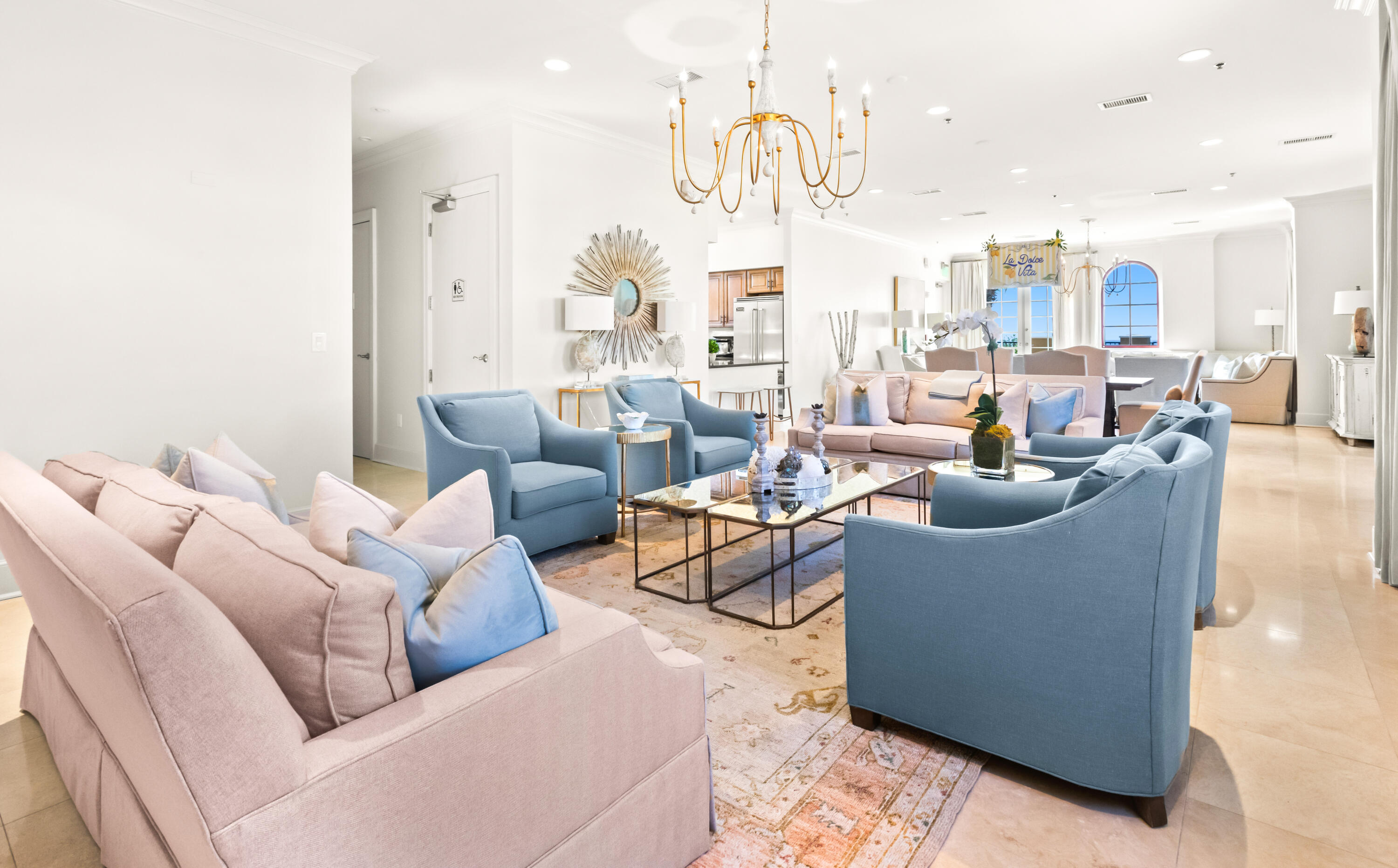 1363 West County Highway 30A, Unit 2120 Santa Rosa Beach, FL 32459 - Photo 69 of 107 a living room with furniture a large window and a chandelier