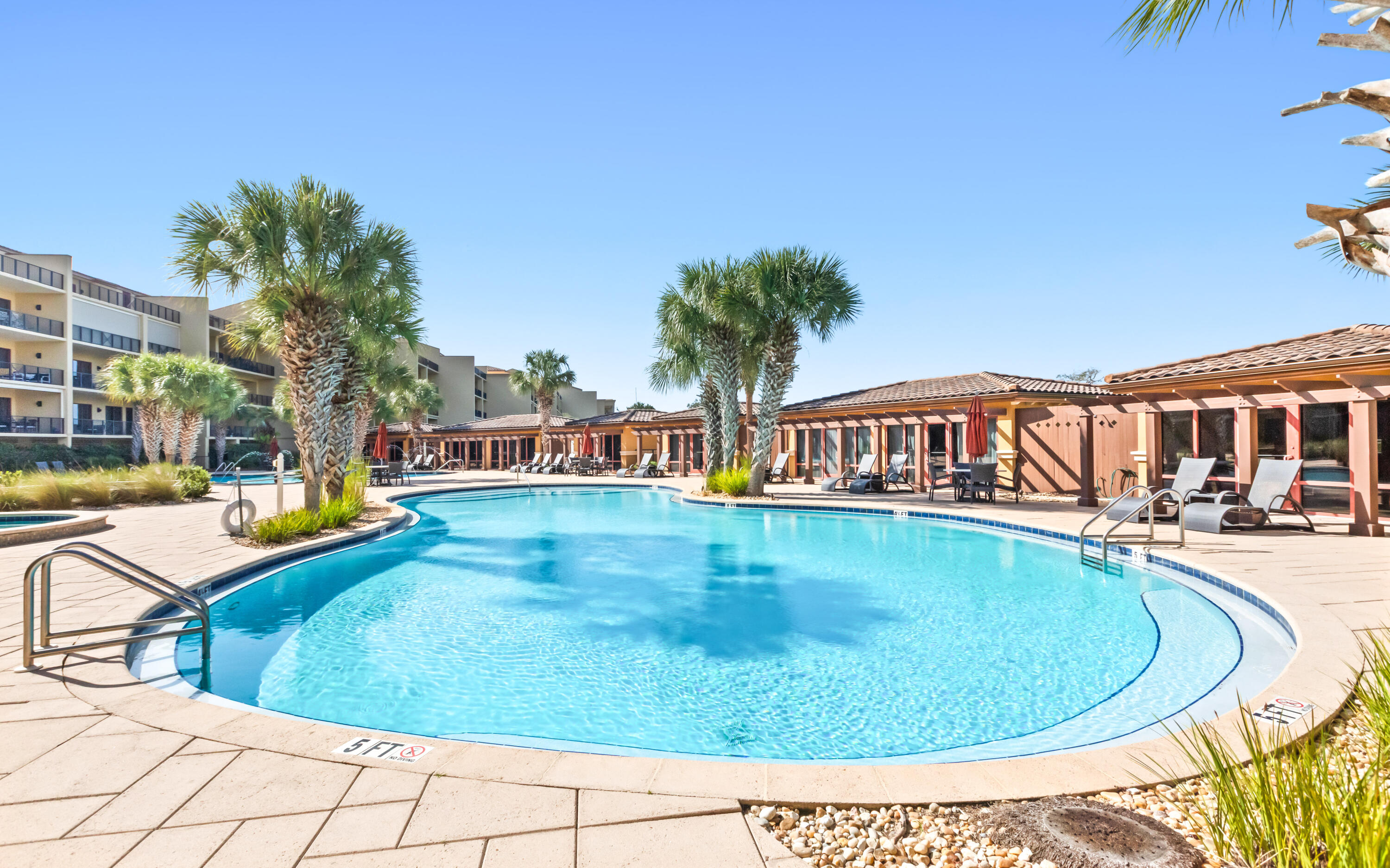 1363 West County Highway 30A, Unit 2120 Santa Rosa Beach, FL 32459 - Photo 76 of 107 a view of a swimming pool with an outdoor seating
