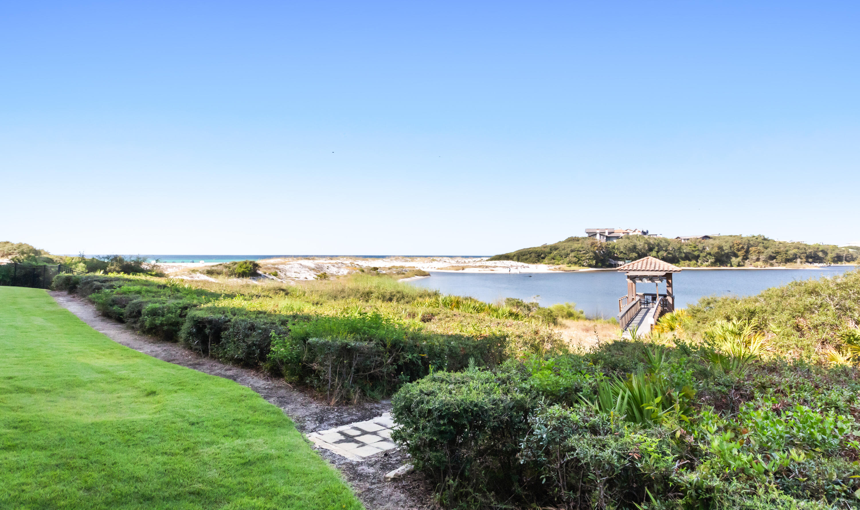 1363 West County Highway 30A, Unit 2120 Santa Rosa Beach, FL 32459 - Photo 82 of 107 a view of a lake with houses in the back