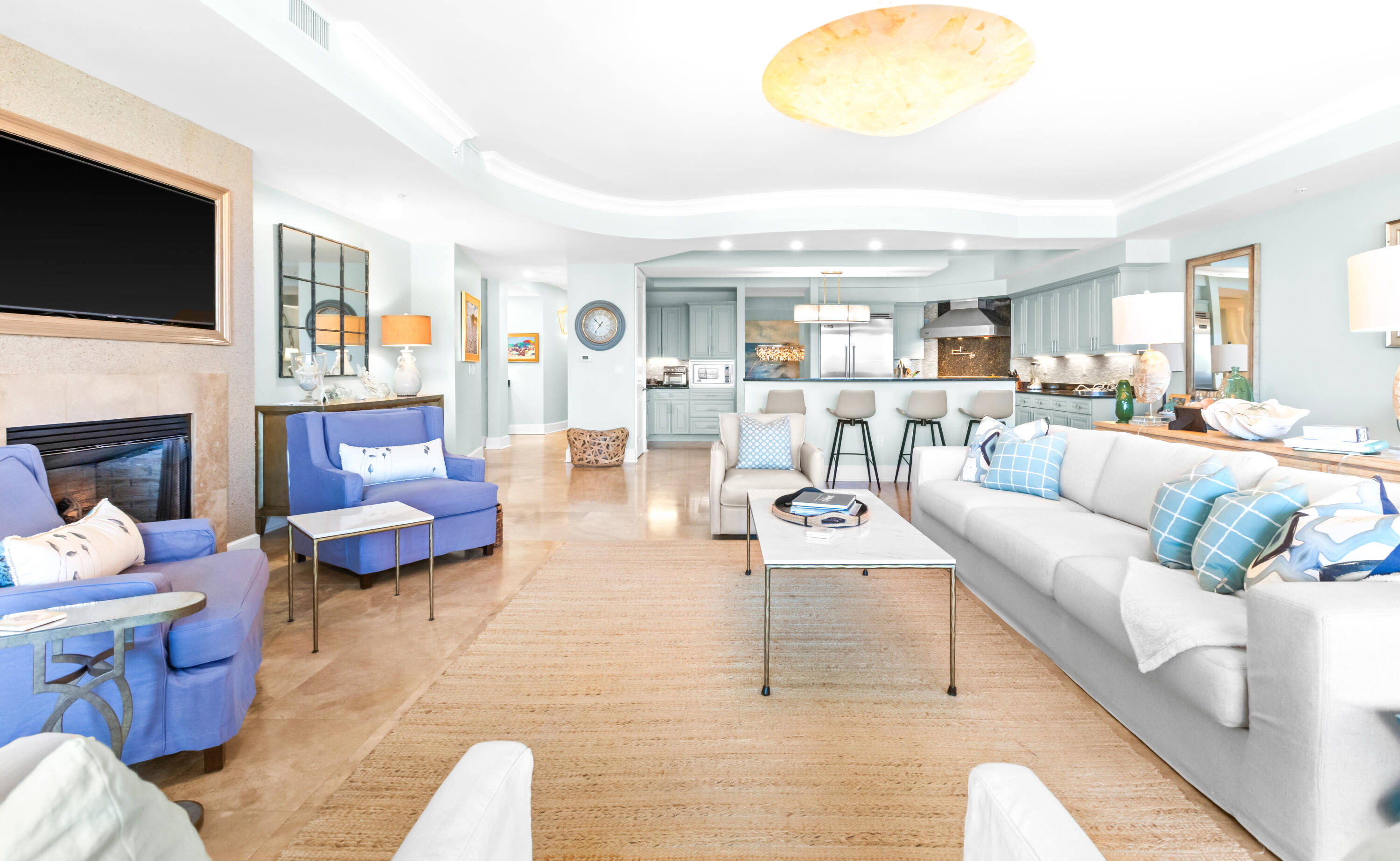 1363 West County Highway 30A, Unit 2120 Santa Rosa Beach, FL 32459 - Photo 10 of 107 a living room with fireplace furniture and a flat screen tv