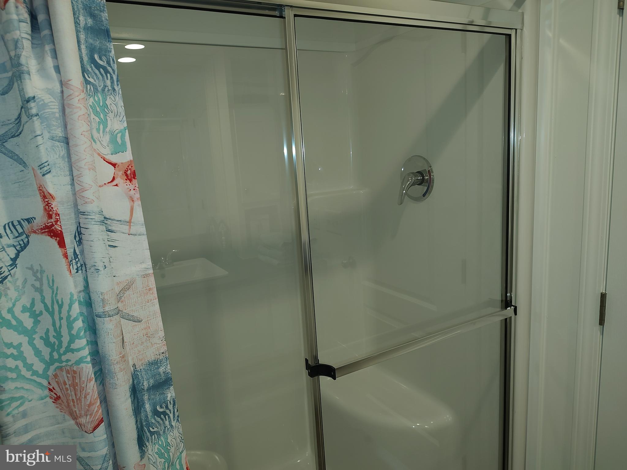 3 Nottingham Drive Lewes, DE 19958 - Photo 19 of 26 a bathroom with a shower