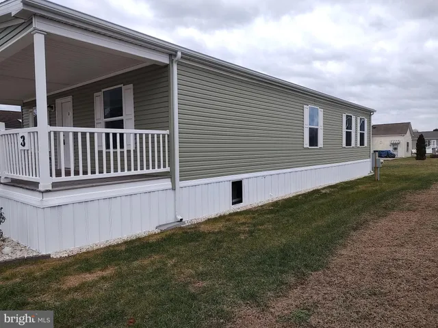 a view of backyard with deck