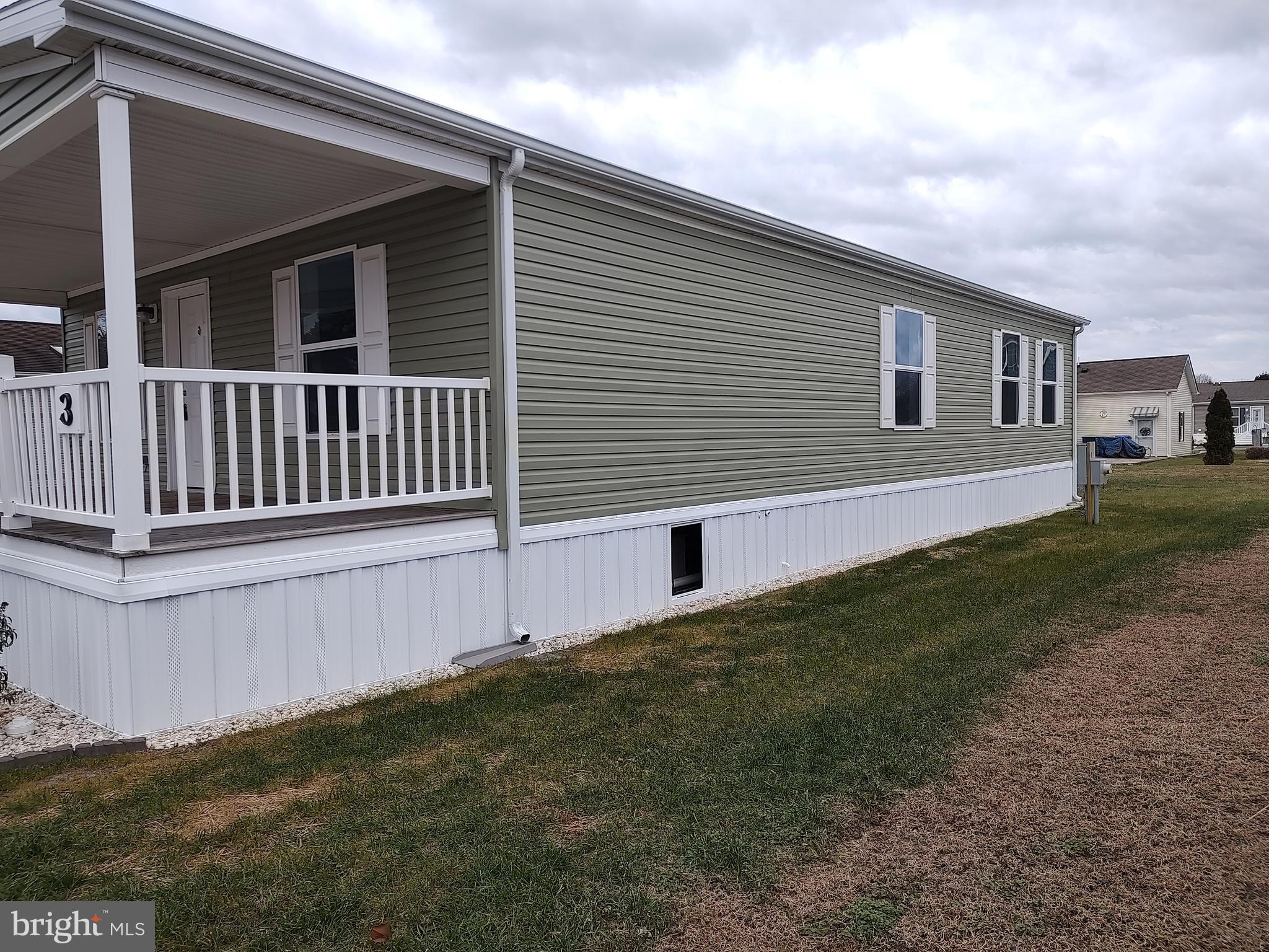 3 Nottingham Drive Lewes, DE 19958 - Photo 3 of 26 a view of backyard with deck