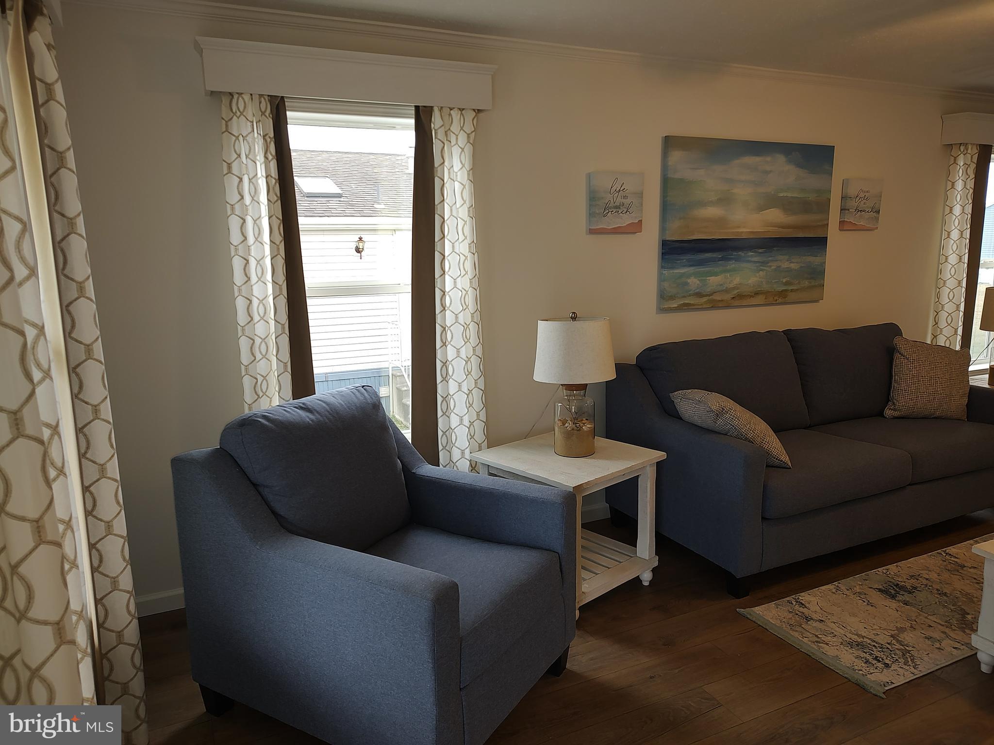3 Nottingham Drive Lewes, DE 19958 - Photo 8 of 26 a living room with furniture and a window