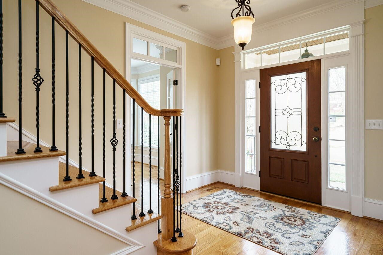 Enter into a light filled foyer with sweeping views into the home. Foyer