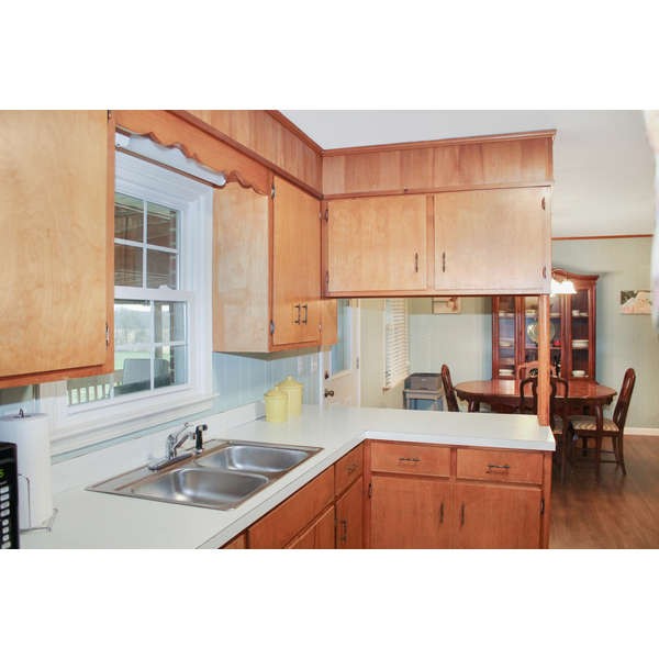 847 Lockmiller Road Winchester, TN 37398 - Photo 14 of 29 a kitchen with a sink cabinets and window