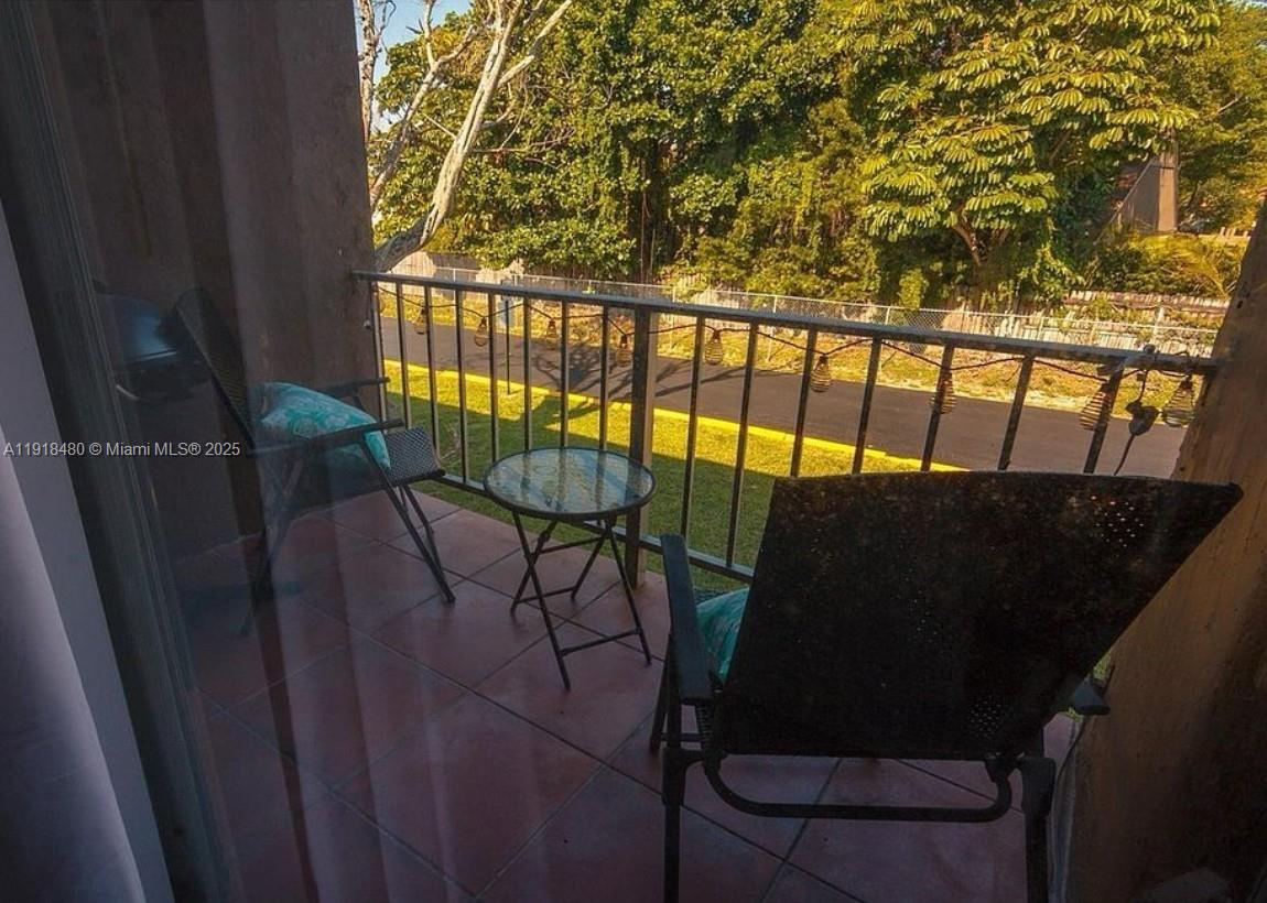 9453 Southwest 76th Street, Unit S7 Miami, FL 33173 - Photo 12 of 12 a view of entryway