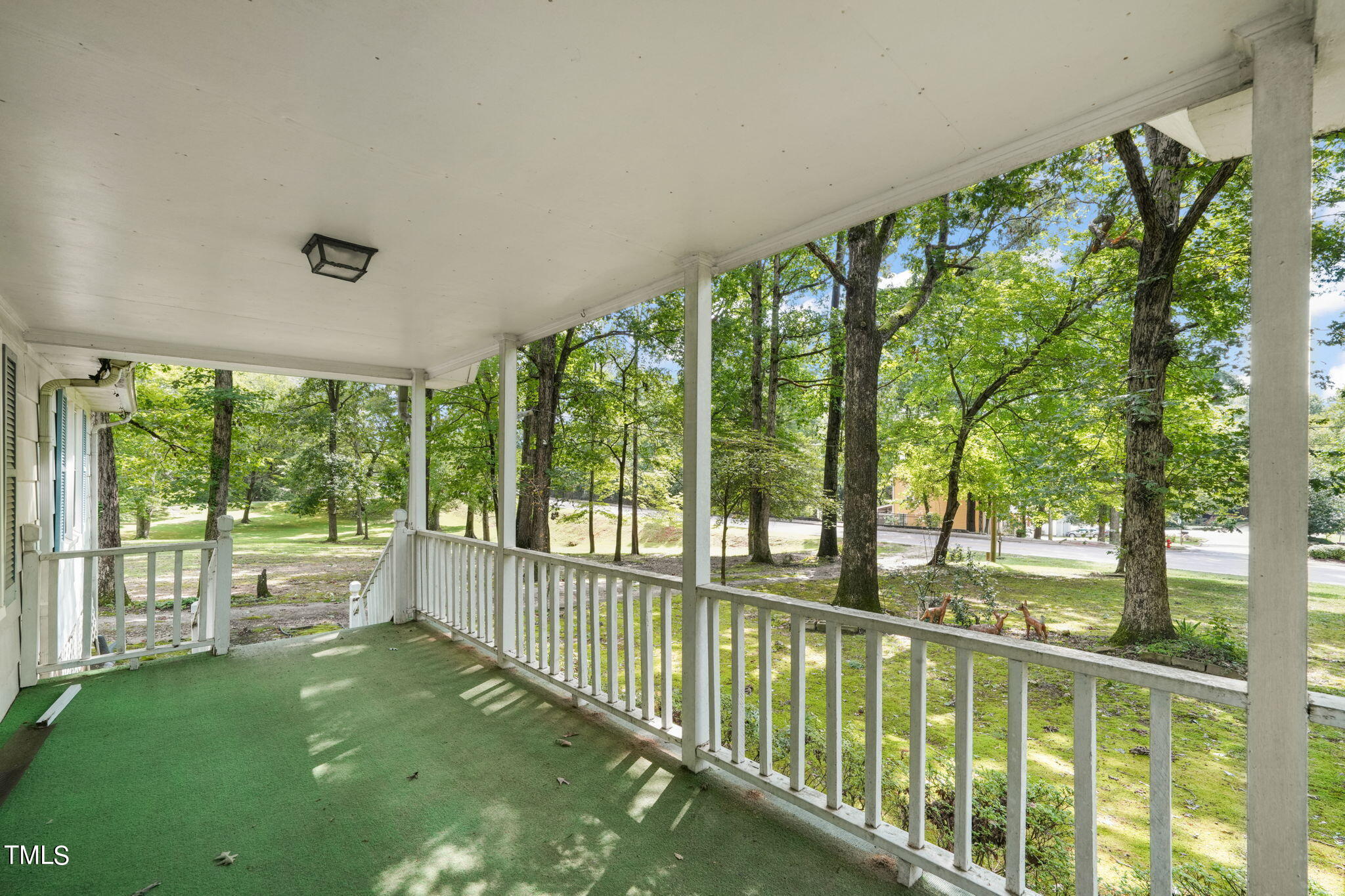 3015 Old Raleigh Road Apex, NC 27502 - Photo 8 of 47 a view of a porch and a yard