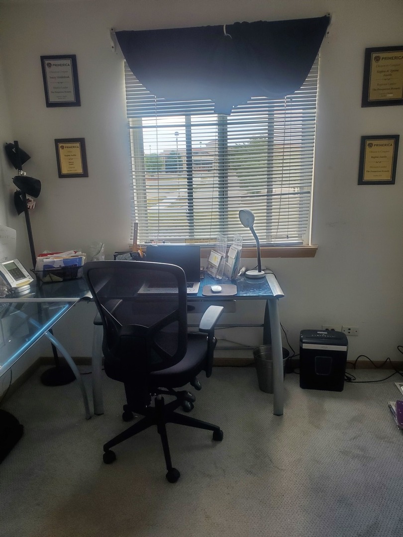 528 Alcott Lane Bolingbrook, IL 60440 - Photo 14 of 15 a view of a workspace with furniture and a window
