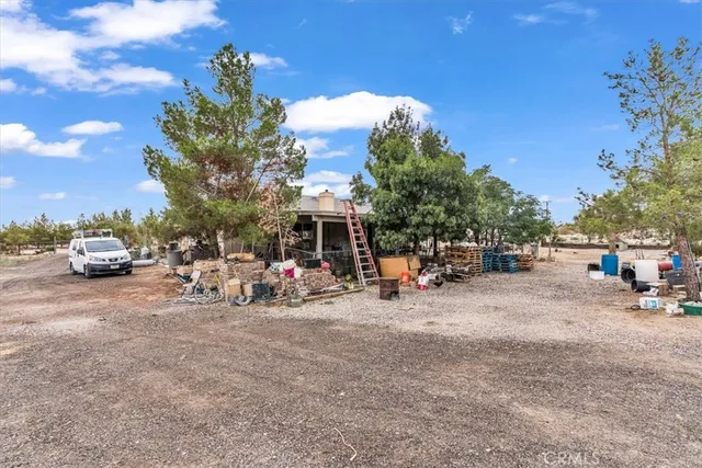 a view of car parked in front of house