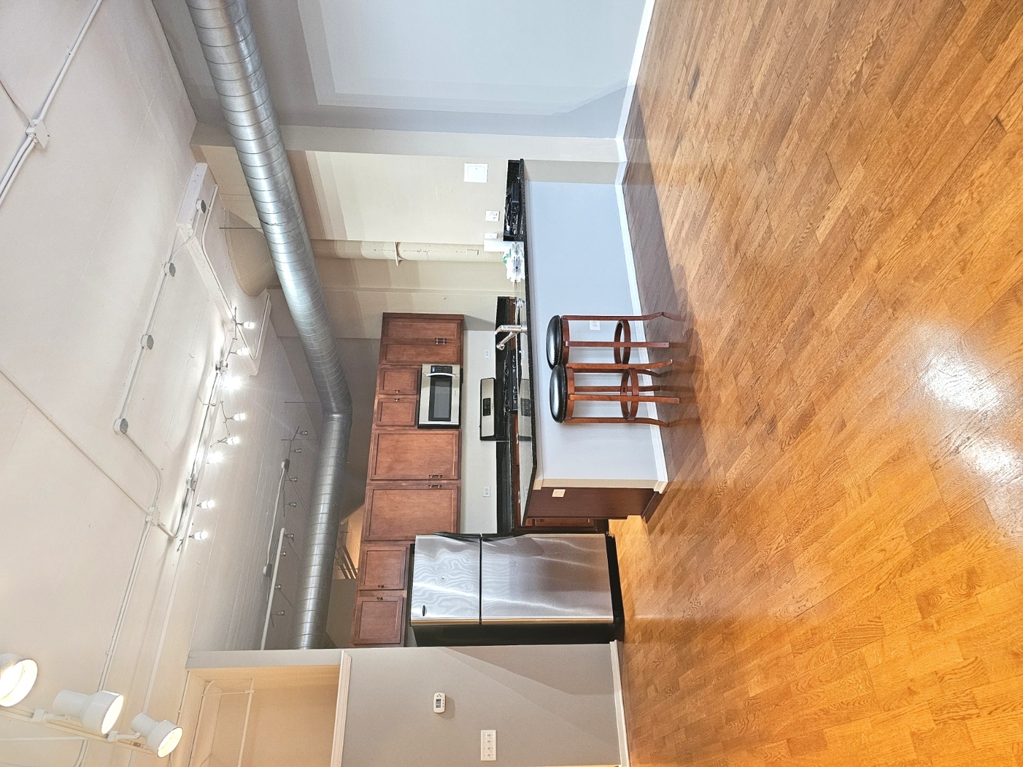 2323 West Pershing Road, Unit 128 Chicago, IL 60609 - Photo 3 of 7 a view of entryway and kitchen