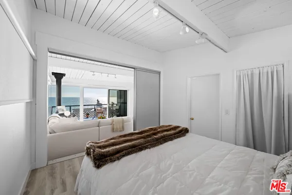 a view of a city street with cars