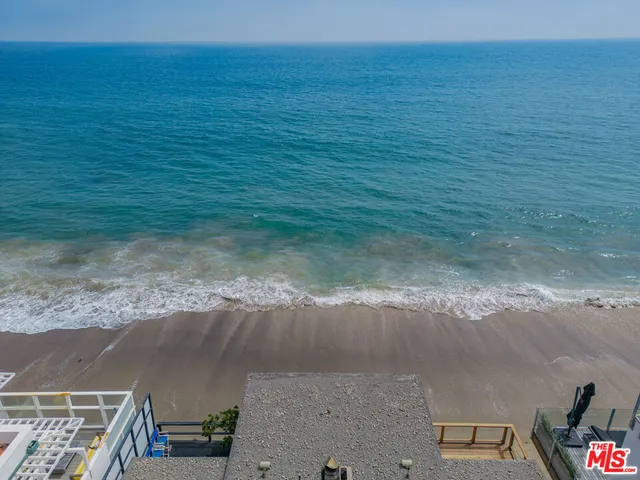 a view of an ocean and a building