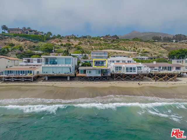 a very nice looking dining room with a rug