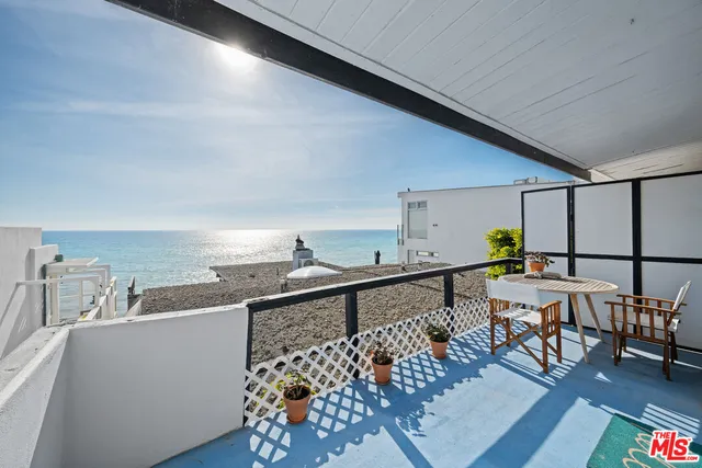 a room with fireplace and a table