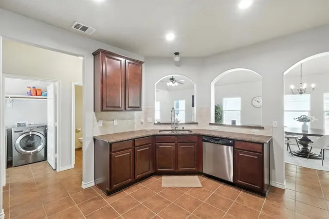 a spacious bathroom with a sink vanity and mirror