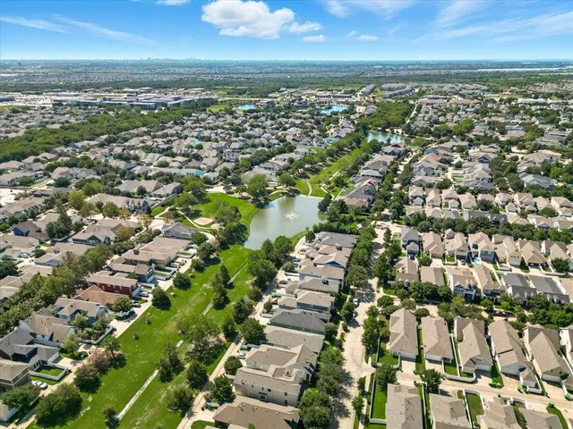 an aerial view of residential building with parking space