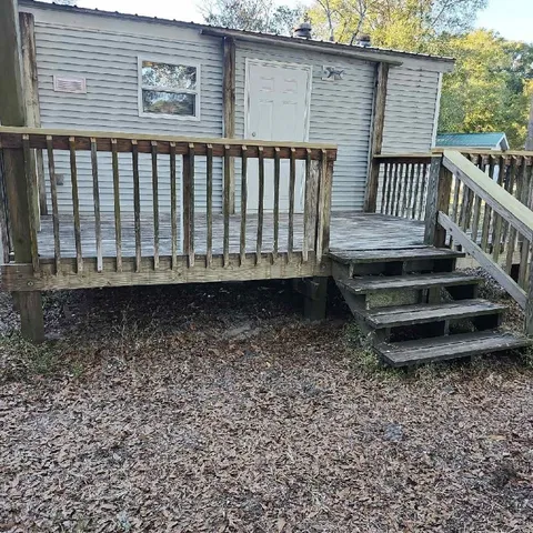 a view of a backyard with a garden