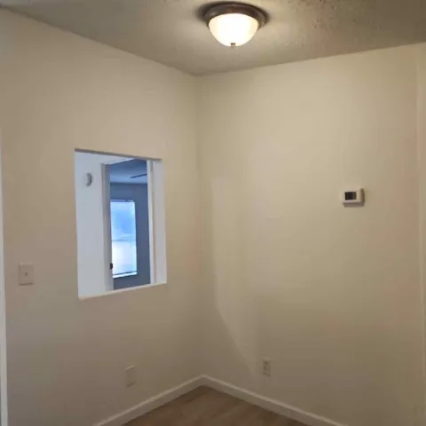 a view of a small space with a window