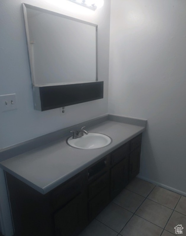 590 Pilot Avenue Wendover, UT 84083 - Photo 15 of 20 Bathroom featuring vanity and light tile patterned flooring