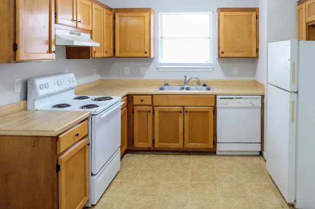 a utility room with washer and dryer