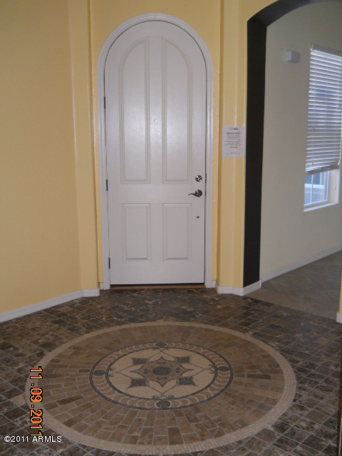 20864 West Ridge Road Buckeye, AZ 85396 - Photo 25 of 37 a view of a livingroom with wooden floor
