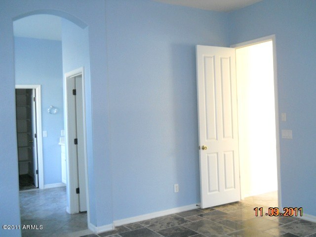 20864 West Ridge Road Buckeye, AZ 85396 - Photo 32 of 37 a view of an empty room and window