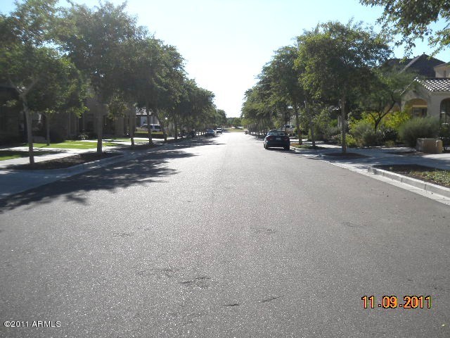 20864 West Ridge Road Buckeye, AZ 85396 - Photo 4 of 37 a view of a street with a building