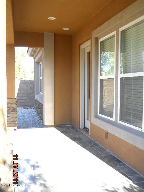 20864 West Ridge Road Buckeye, AZ 85396 - Photo 5 of 37 a view of an empty room and window