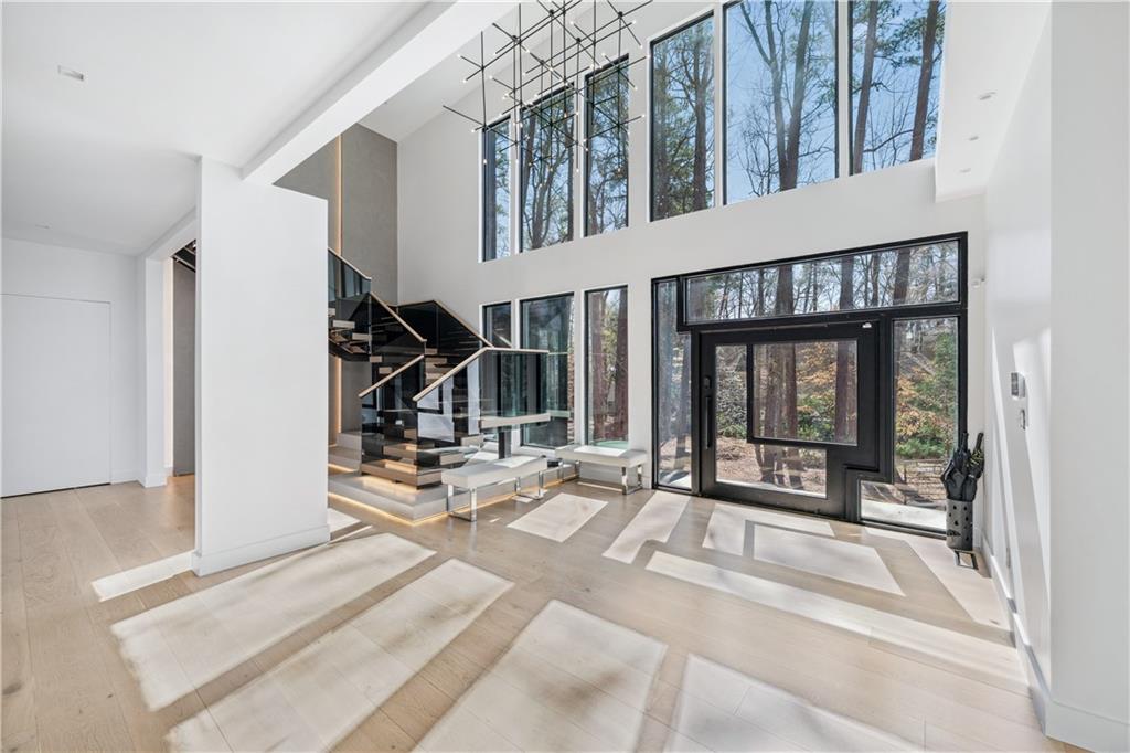 1355 Moores Mill Road Northwest Atlanta, GA 30327 - Photo 8 of 45 a view of a entryway door of the house