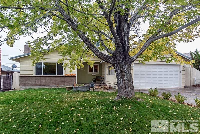 2260 Ives Avenue Reno, NV 89503 - Photo 1 of 1 a view of a house with backyard and a tree