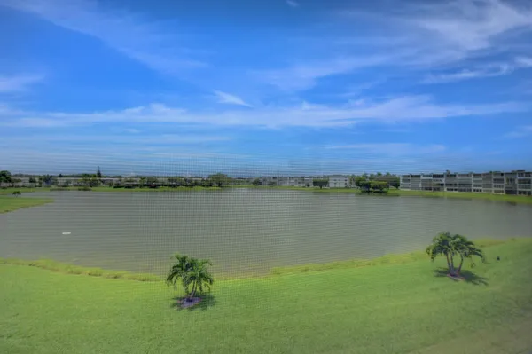 a view of a lake with a city