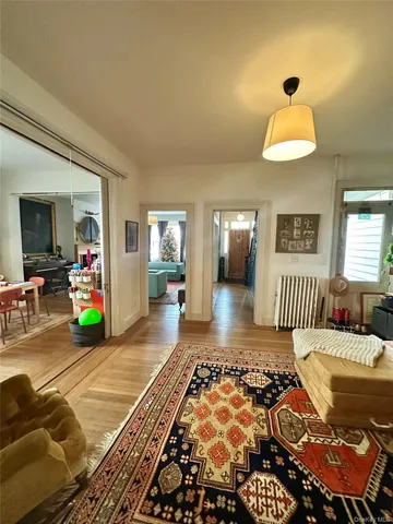 a dining room with a table and chairs